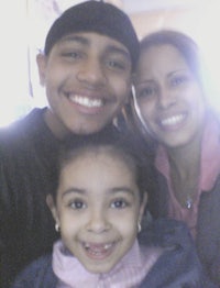 a man and a young girl smiling for the camera